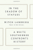 IN THE SHADOWS OF STATUES